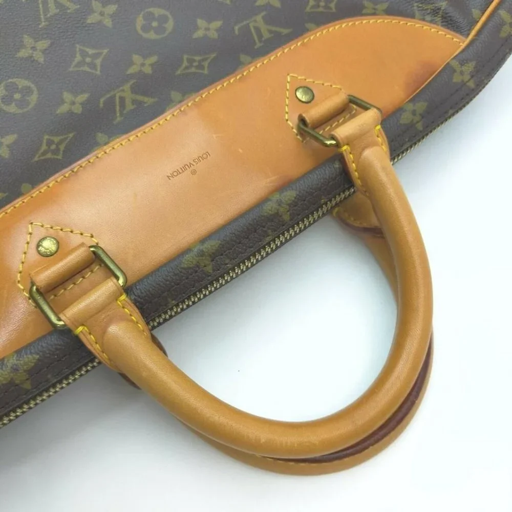 Louis Vuitton Monogram Alize 1 Poche Travel Bag